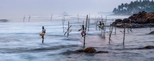 Sri Lanka Travel Photography Stilt fishermen at Midigama Beach near Weligama South Coast Sri Lanka Asia
