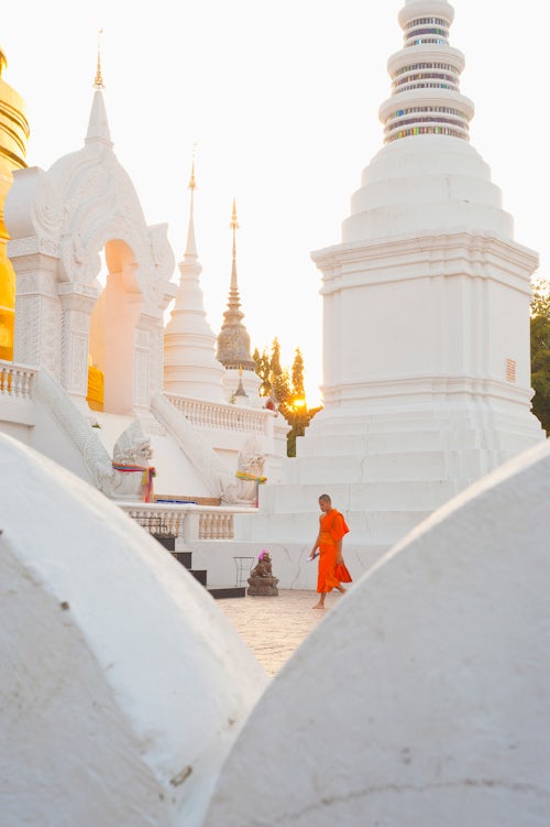 Thailand Documentary Travel Photography Buddhist monk walking around Wat Suan Dok Temple in Chiang Mai Thailand Southeast Asia Asia Southeast Asia