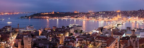 Turkey Travel Photography Mosques at night in the historical Sultanahmet District of Istanbul seen across the Golden Horn Turkey Eastern Europe