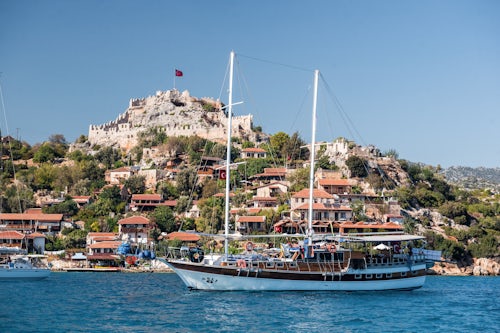 Turkey Travel Photography Simena Castle and Gulet sailing boat seen from Kekova Bay Antalya Province Lycia Anatolia Mediterranean Sea Turkey Eastern Europe
