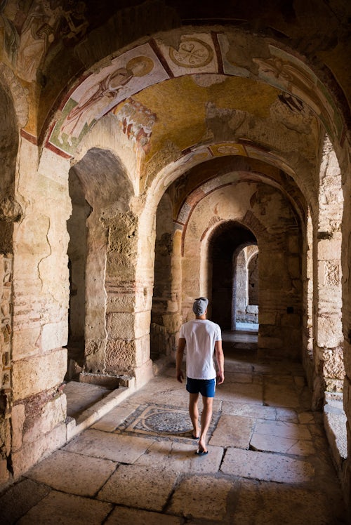 Turkey Travel Photography Tourist at ancient ruins of St Nicholas Church Antalya Province Lycia Anatolia Turkey Eastern Europe