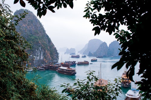 Vietnam Travel Photography Junk ship boat trip cruise in beautiful Ha Long Bay Vietnam Southeast Asia