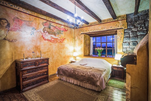 Architecture and Hotel Photography by Professional Freelance Hotel Property and Resort Photographer in London England UK Bedroom at the Inca Hacienda San Agustin de Callo luxury boutique hotel