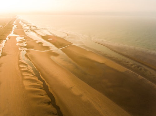 Drone Photography by UK London Freelance Drone Photographer Camber Sands Beach at sunrise Camber near Rye East Sussex England 2