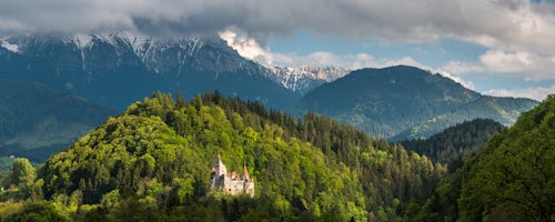 Landscape Photography by Professional Freelance UK Landscape Photographer Bran Castle Draculas Castle with Carpathian Mountains behind Transylvania Romania